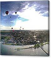 Hot Air Balloons Flying Over A River Canvas Print