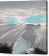 Icebergs Washed Up On Volcanic Sandy Canvas Print