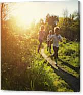 Kids Running In Nature. Canvas Print