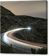 Lights Of Vehicles Circulating Along A Road Of Mountain With Curves Closed In The Night Canvas Print