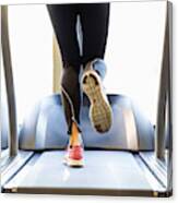 Low Section Of Woman Exercising On Treadmill Canvas Print