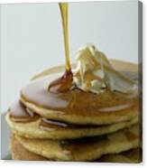 Maple Syrup Being Poured Onto A Stack Of Pancakes Canvas Print