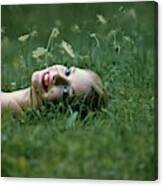 Model Gretchen Harris Lying In A Field Canvas Print