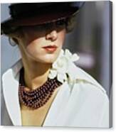 Model Wearing A Hat And Beads Canvas Print