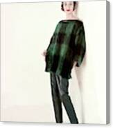 Model Wearing A Plaid Sweater And Leather Pants Canvas Print