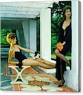 Models Wearing A Swimsuit And Lingerie On A Patio Canvas Print