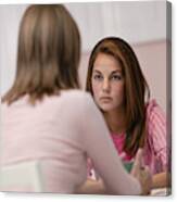 Mother And Daughter Talking Seriously Canvas Print