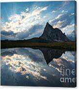 Mountain Peak And Clouds Reflected In Alpine Lake In The Dolomit Canvas Print
