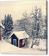 Old Cottages In A Snowy Rural Landscape Canvas Print