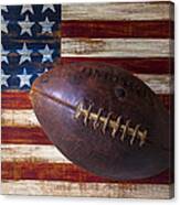 Old Football On American Flag Canvas Print