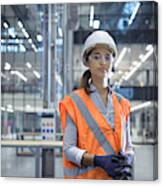 Portrait of apprentice in workshop of railway engineering facility Canvas Print
