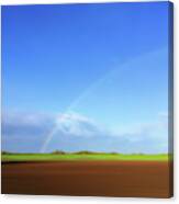Rainbow In Field Canvas Print