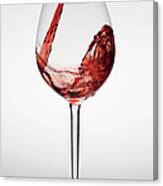 Red Wine Being Poured Into A Glass Canvas Print