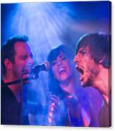 Rock Band On Stage Screaming Into Microphone Canvas Print