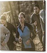 Runners Jogging On Dirt Path In Forest Canvas Print