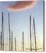 A Forest Of Sailboat Masts Silhouetted By A Setting Sun Canvas Print