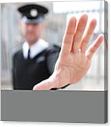 Security Guard Holding Hand Out Canvas Print