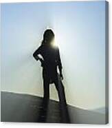 Silhouette Of Young Girl On Top Of A Mountain. Canvas Print
