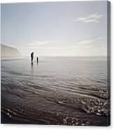 Silhouettes Of Father And Child At Beach Canvas Print