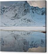 Snow Covered Mountain Reflected In Lake Canvas Print