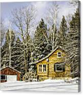 Snowy Log Home Canvas Print