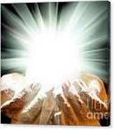 Spiritual Light In Cupped Hands On A Black Background Canvas Print