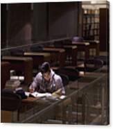 Student Working In Library At Night Canvas Print