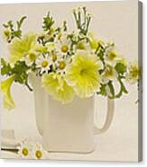 Teapot Of Yellow Petunias And Daisies Canvas Print