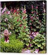 The Lion In The Hollyhocks Canvas Print