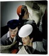 Three Models Wearing Assorted Hats Canvas Print