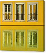Three Windows Reflecting In The Water Canvas Print