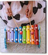 Toddler Playing A Xylophone At Home Canvas Print