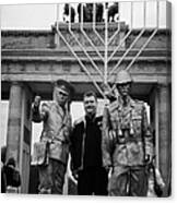 Tourist Posing For Photograph With Silver Painted Street Entertainer Dressed As East German Guard Brandenburg Gate Berlin Germany Canvas Print