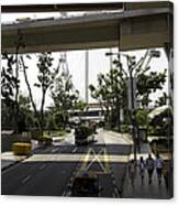 Tourists And Traffic On The Route Leading To The Singapore Flyer Canvas Print