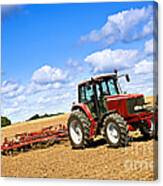 Tractor In Plowed Farm Field Canvas Print