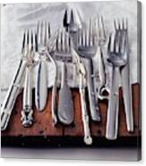 Various Forks On A Wooden Board Canvas Print