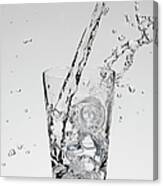 Water Being Poured Into A Glass Canvas Print