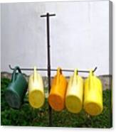 Watering Cans In A Village Cemetery In Canvas Print
