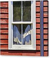 White Wood Window Against A Faded Weathered Red Barn Wall Canvas Print