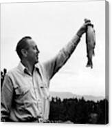 William S. Paley Holding A Fish Canvas Print