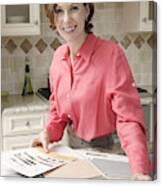 Woman In Kitchen With Tile Samples Canvas Print