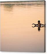 Young Boy Swimming In Clear Waters Canvas Print