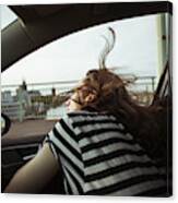 Young Woman Leaning Out Of Car Window Canvas Print