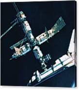 The Space Shuttle Docked With A Space Station #1 Canvas Print