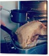 Basting A Turkey With White Wine And Canvas Print