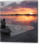 Canoe At Sunset Canvas Print