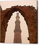 Cross Section Of The Qutub Minar Framed Within An Archway In Foggy Weather Canvas Print