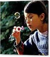 Girl Blowing Bubble-wand Canvas Print