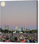 A Giant Acl Helium Ballon Lights Up The Night Sky During The Austin City Limits Music Festival Overlooking The Austin Skyline On October 12, 2014. Canvas Print