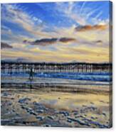 A Surfer Heads Home Under A Cloudy Sunset At Crystal Pier Canvas Print